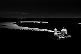 The church in the backdrop of the Mandovi River Church of St. Cajetan.jpg