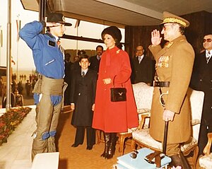 Crown Prince Reza respects his father after flight.jpg