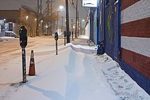 Deep Ellum sidewalk covered with snow in Dallas snow storm 2021.jpg