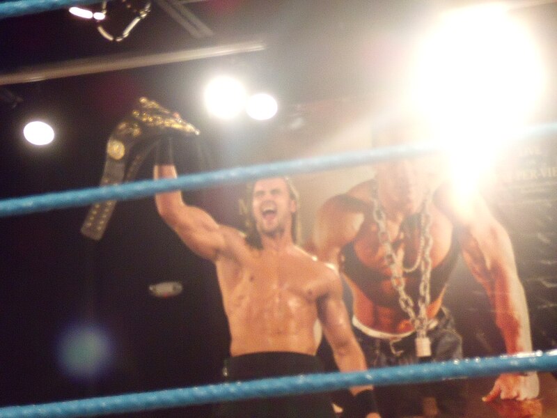 File:Drew McIntyre Hoisting up FCW Championship.jpg