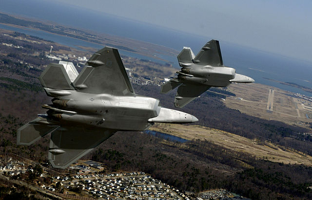 Two F-22A turn in on final approach to Langley Air Force Base