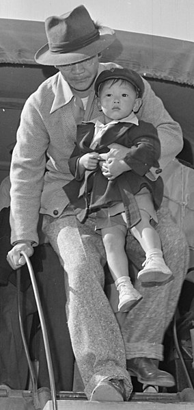 File:Father and child detail, Granada Relocation Center, Amache, Colorado. Center residents arrive by truck from Amache to board . . . - NARA - 539944 (cropped).jpg