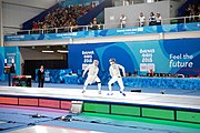 Deutsch: Fechten bei den Olympischen Jugend-Sommerspielen 2018: Tag 1, 7. Oktober 2018, Jungen, Säbel, Finale - Krisztián Rabb (HUN) - Hyun Jun (KOR) (USA) 15:13 English: Fencing at the 2018 Summer Youth Olympics at 7 October 2018 – Boys' sabre Gold medal match – Krisztián Rabb (HUN) Vs Hyun Jun (KOR) (USA) 15:13