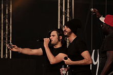 Orelsan (left) and Gringe (centre) at the Festival des Vieilles Charrues in 2014