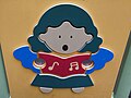 Girl angel bring music notes and singing a song.jpg