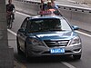 A blue Guangzhou taxi