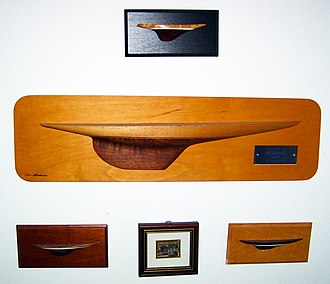 Several half hull model ships hanging on wall Half hull model ship.jpg