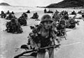 Soldiers of the 5th division of the Imperial Japanese Army landing on a beach during the Malayan invasion, December 1941