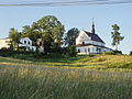 Polski: Odrowąż, widok od zachodu na kościół św.Jacka i św.Katrzyny, dzwonnicę i plebanię English: western landscape on the church, bell tower & vicarage