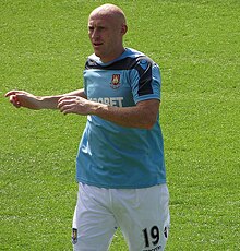Collins warming up for West Ham United in 2012 James CollinsWHU2012.jpg