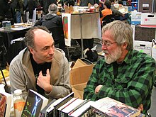 Lawrence Jarach (left) and John Zerzan (right) are two prominent contemporary anarchist authors, with Zerzan being a prominent voice within anarcho-primitivism and Jarach a notable advocate of post-left anarchy. Jarach and Zerzan.JPG