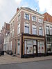 Woonhuis in eclectische stijl Vm. woonhuis in eclectische stijl met Art Nouveau-pui (Winkelpand)