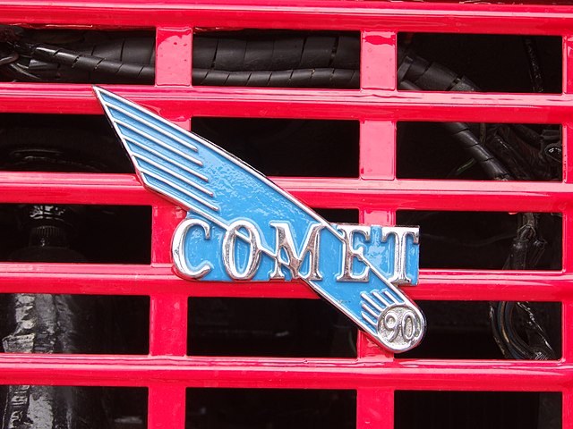 Badge on a 1954 Leyland Comet 90 flatbed lorry