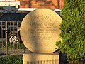 English: Looking east at monument to inventor Antonio Meucci in Meucci Triangle, west of the 86th Street telephone exchange in Gravesend, Brooklyn on a sunny late afternoon. Engraving depicts a type of receiver Meucci did not invent