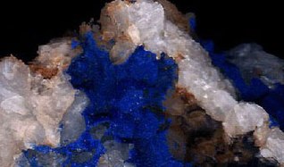 Fresh, unweathered azurite crystals showing the deep blue of unaltered azurite. From Špania Dolina, Slovakia