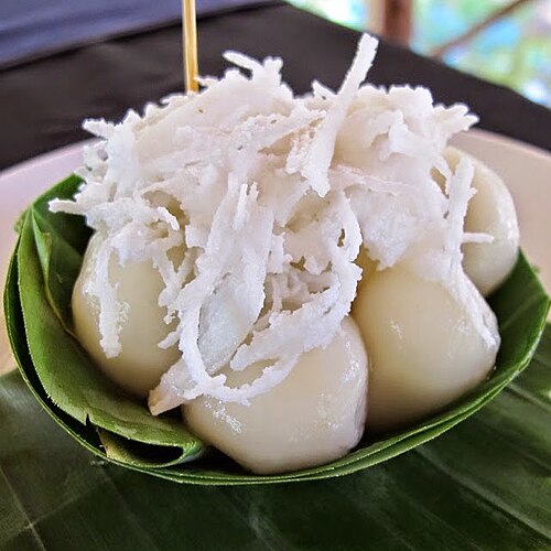 Num Plae Ai (ផ្លែអាយ) Khmer sticky rice balls with coconut topping