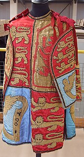 A modern-day tabard of a Herald of Arms, made of silk satin Pursuivant tabard.jpg