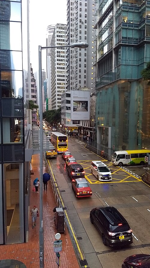 Western end of Queen's Road East, viewed from the overpass. Three Pacific Place is on the right. Hopewell Centre is visible in the distance.