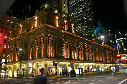 The building illuminated at night in 2005