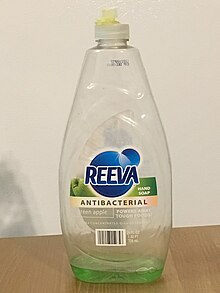 A near- emptied dispenser of Reeva liquid soap marketed as "Antibacterial" with the active ingredient chloroxylenol, typically for the use of cleaning dishes and hands in kitchens. Reeva antibacterial liquid soap.jpg
