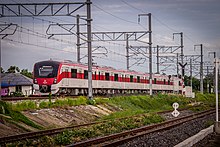 The SRT Dark Red Line, an electrified commuter rail line, features the Hitachi AT100 model train in its fleet, capable of reaching speeds of up to 160 km/h. SRTRedline 1000series WiteePhotography. For wikipedia.jpg