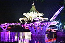 The state assembly building along with newly opened Darul Hana Bridge at night. Sarawak parliament 2.jpg