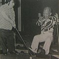 Sky Low Low and Tom Thumb playing golf - Two midgets stage mini-olympic games....... it's a draw - Wrestling Revue - October 1973 p.38.jpg