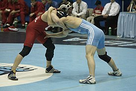 Cornell and Columbia wrestlers in dual team match, 2007 Students wrestling 06.jpg