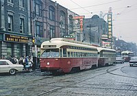 MU-train with a class A-11 (former Cleveland) & A-7 car on the Bloor streetcar line at Bathurst Street in 1965 TTC PCC train led by 4630, JANE BLOOR cars on Bloor at Bathurst, Toronto, Ont. on September 8, 1965 (24134699962).jpg