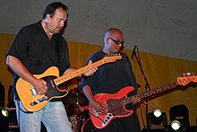 Babjak (left) and Jornacion in 2009 in Rochester, Minnesota TheSmithereensGuitarists.JPG