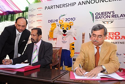 Suresh Kalmadi, Chairman of Organising Committee of 2010 Commonwealth Games and Mr. Pawan Munjal, MD & CEO of Hero Honda signing an MoU on the major private sector partner for the Games