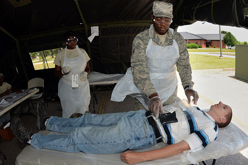 File:U.S. Air Force Senior Airman Quintein Quinones, right, a mortuary affairs specialist with the 169th Force Support Squadron, South Carolina Air National Guard, simulates processing a deceased patient during 130601-Z-WT236-020.jpg