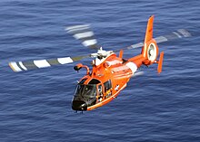 US Navy 021220-N-7590D-020 Coast Guard HH-65A rescue helicopter performs a homeland security flight over the waters of near Oahu, Hawaii.jpg
