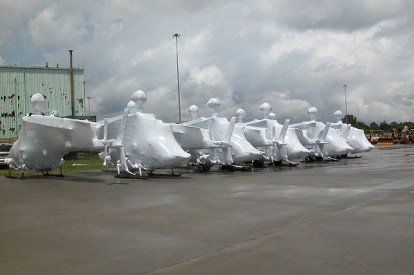 Shrink-wrapped OH-58 Kiowa helicopters to be shipped.