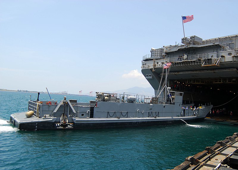 File:US Navy 090415-N-5538K-231 Landing Craft Utility (LCU) 1627 moves into position to take on equipment from the well deck of the forward deployed amphibious assault ship USS Essex (LHD 2).jpg