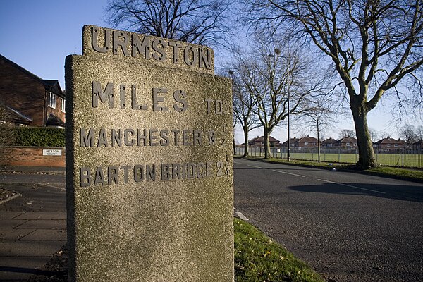 A milestone erected to commemorate the opening of Bowfell Road, in 1937