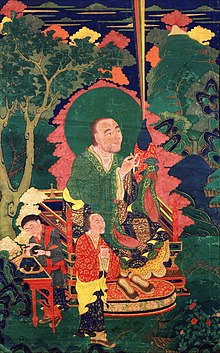 Vanavasin receiving the blessings of the Three Jewels as a rainbow in a blue vase (16th century). Vanavasin, one of the 16 elders (Arhat or Sthavira) - 16th century Tibetan thangka.jpg