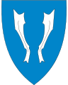 1860 Vestvågøy I blått to opprette og motstilte sølv tørrfisker  og er symbol på fiskeri