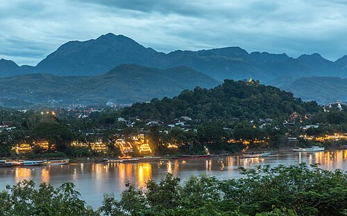 View of Mount Phou Si and Mekong bank at sunset seen from Wat Chomphet in Luang Prabang Laos