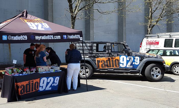 The Radio 92.9 street team in Cambridge, Massachusetts sampling products from Whole Foods Market.