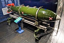 Colour photo of a green bomb