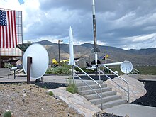 Displays at front entrance: sounding rockets used at Alamogordo and whisper dishes Whisper dishes New Mexico Museum of Space History.jpg