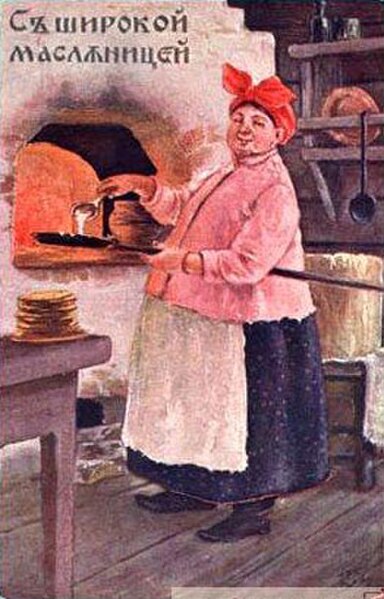 An old woman prepares blini in a Russian oven for Maslenitsa