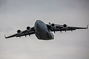 A Boeing C-17 Globemaster III, tail number 95-0103, taking off from RAF Mildenhall in the United Kingdom. It is assigned to the 62nd Airlift Wing and the 446th Airlift Wing at Joint Base Lewis McChord in Washington, USA.