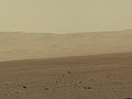 Gale Crater rim about 18 km (11 mi) quilòmetres (11,184681456 meu) North of the Curiosity rover (August 9, 2012).