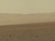 Gale rim about 18 km (11 mi) north of Curiosity (August 9, 2012)