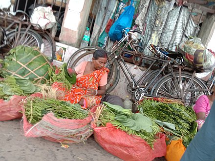 A Bengali woman selling betel leaves in Howrah
