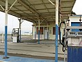 An abandoned gas station at 10th Ave./Avenue N.