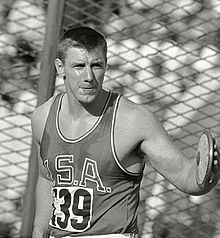 Oerter holding discus