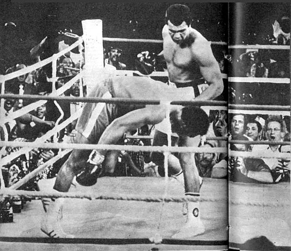 Foreman falling to the canvas after a hard right straight to the face